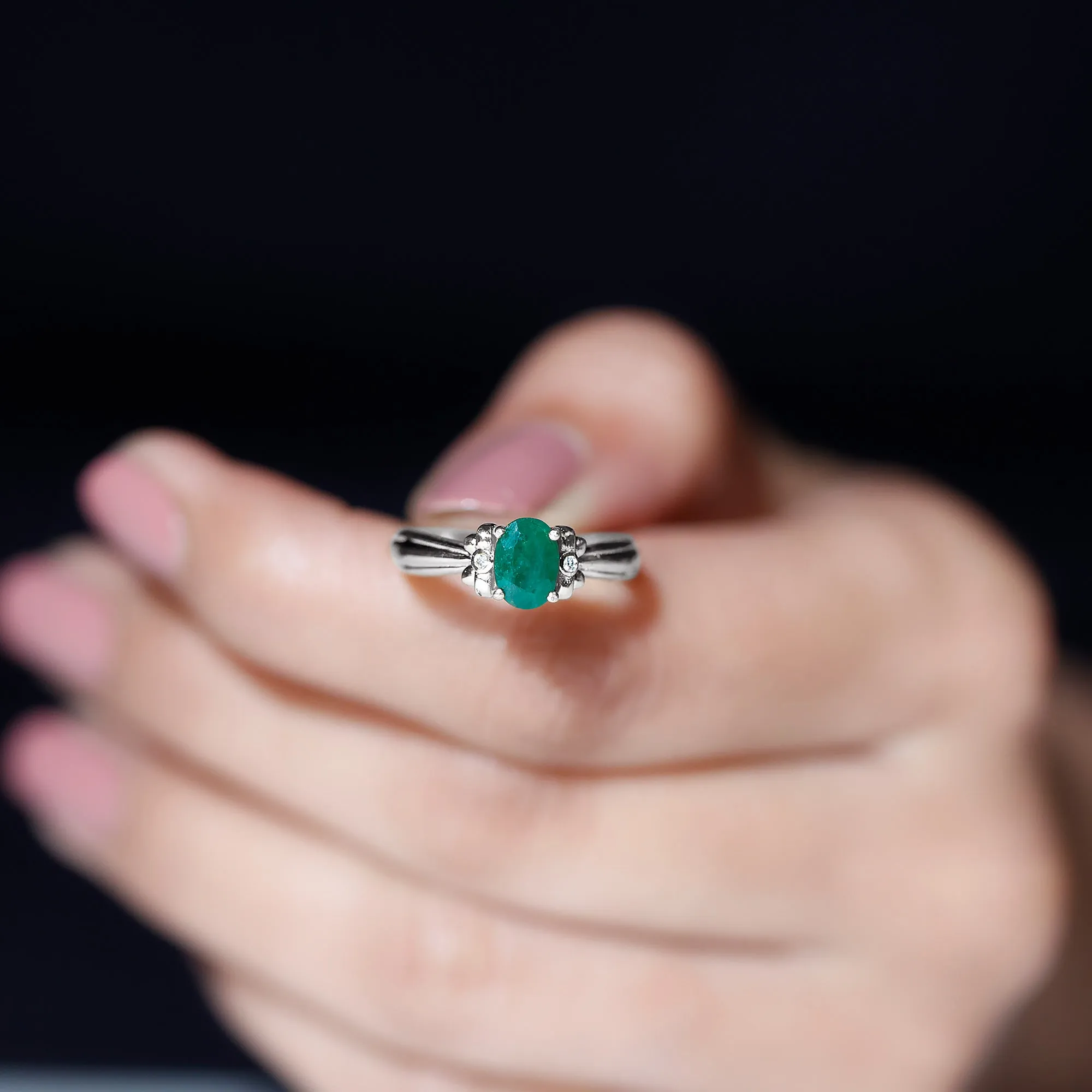 0.75 CT Oval Emerald Solitaire Floral Ring with Diamond Accent