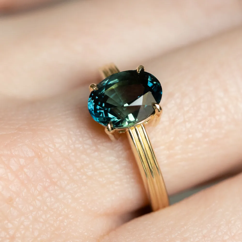 3.59ct Oval Deep Teal Madagascar Sapphire Low Profile Tri-Band "Three Winds" 4 Prong Solitaire in 14k Yellow Gold