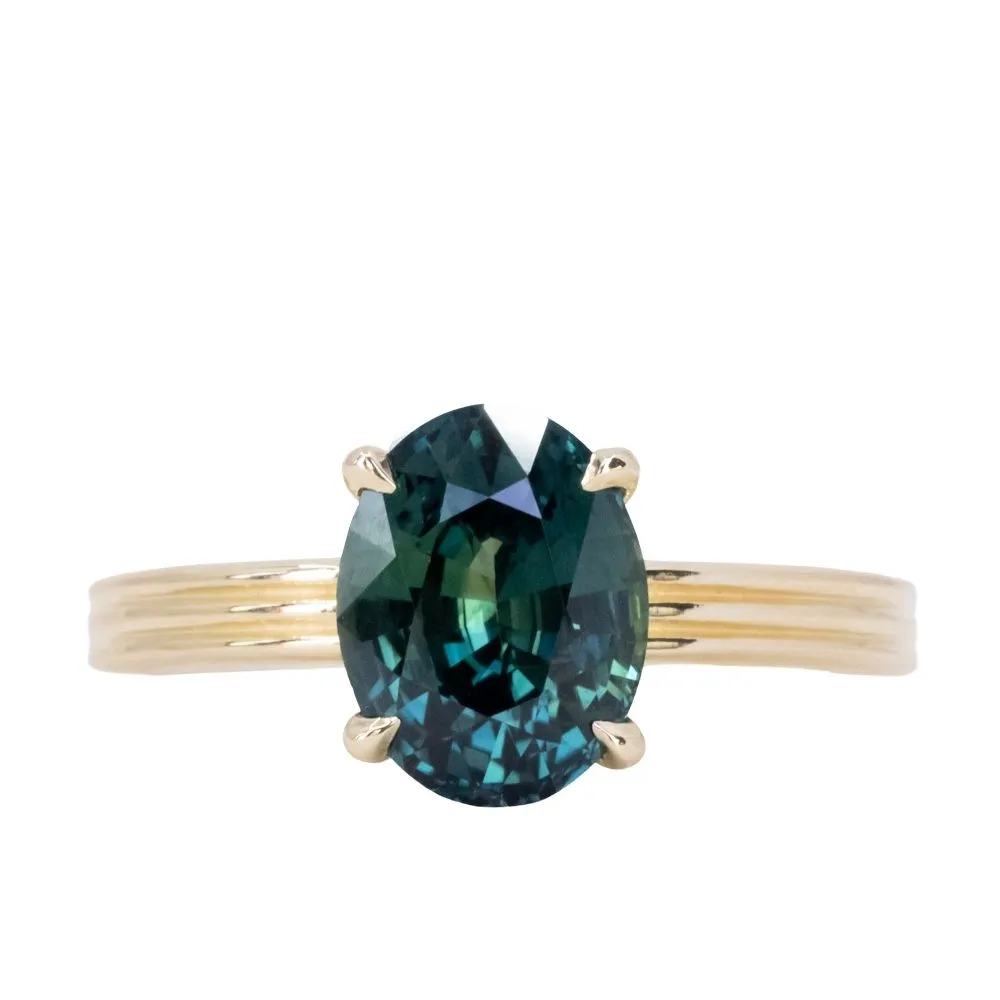 3.59ct Oval Deep Teal Madagascar Sapphire Low Profile Tri-Band "Three Winds" 4 Prong Solitaire in 14k Yellow Gold