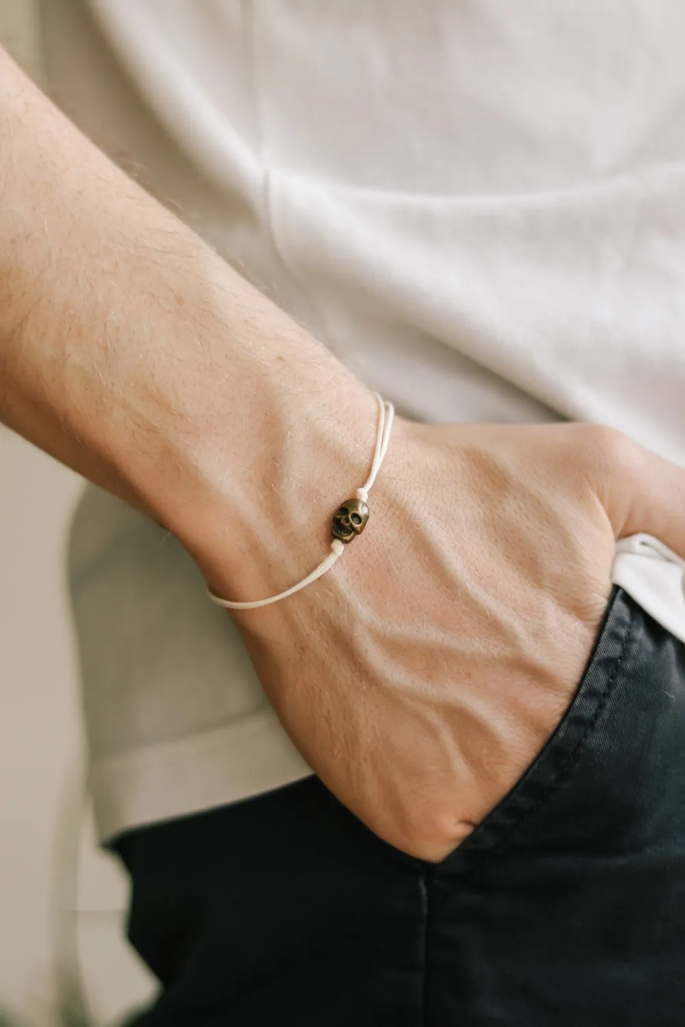 Bronze skull bead bracelet for men, beige cord, gift for him