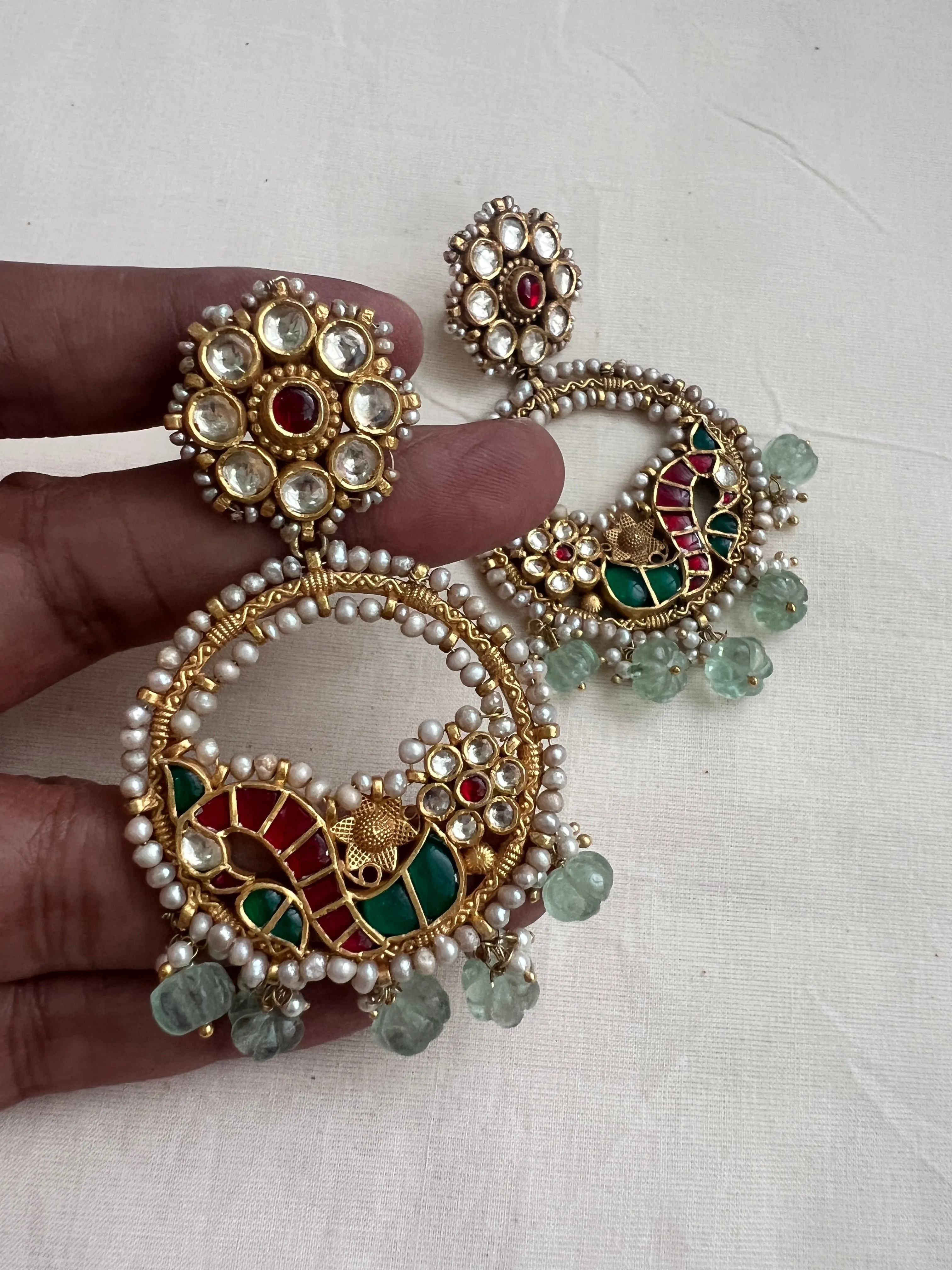 Gold polish kundan, ruby & emerald earrings with pearls and jade beads