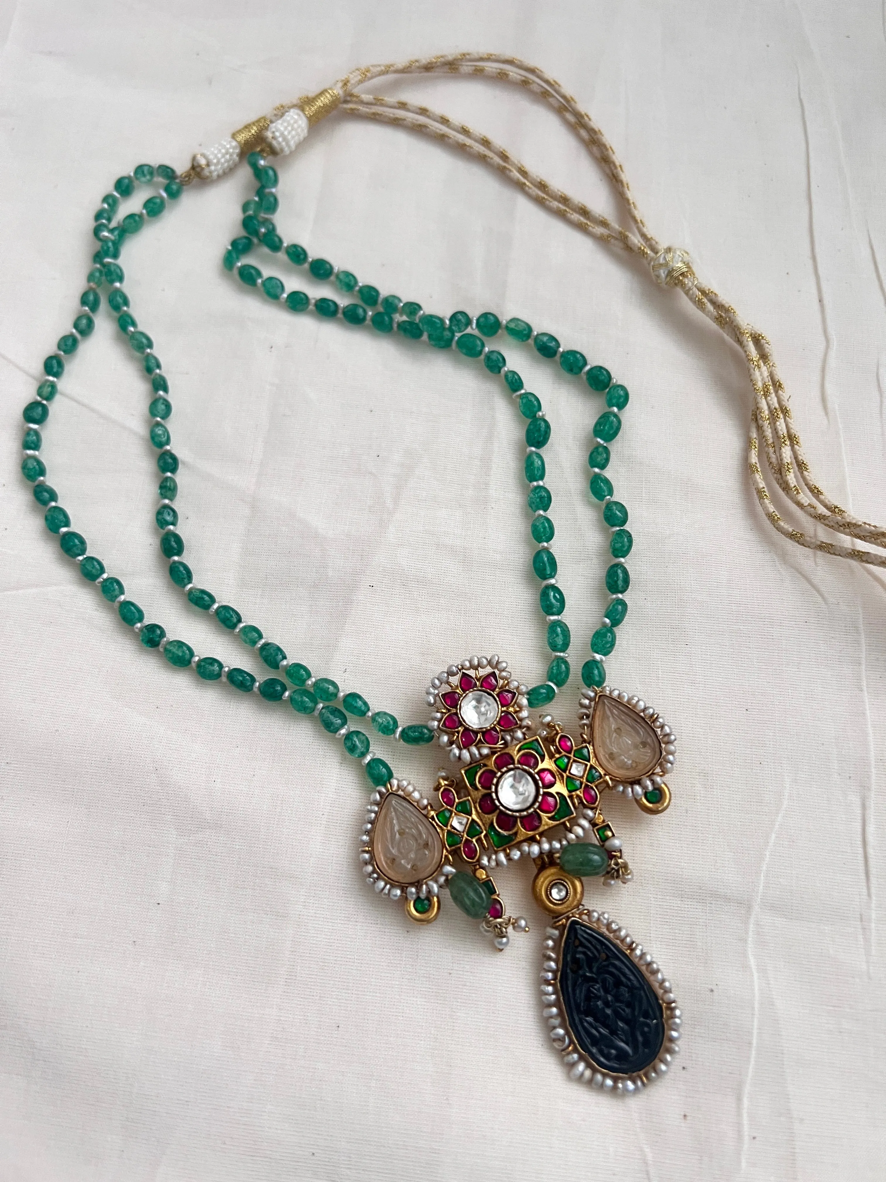 Gold polish stimulated kundan, ruby & emerald pendant,  jade & pearls beads chain