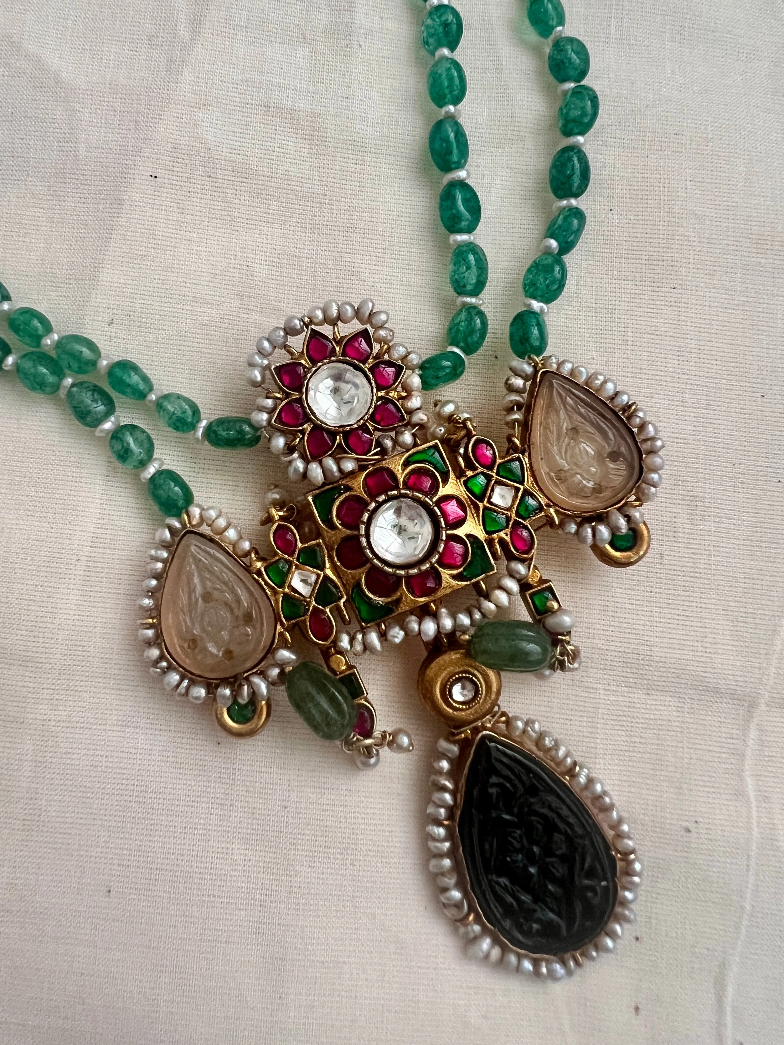 Gold polish stimulated kundan, ruby & emerald pendant,  jade & pearls beads chain