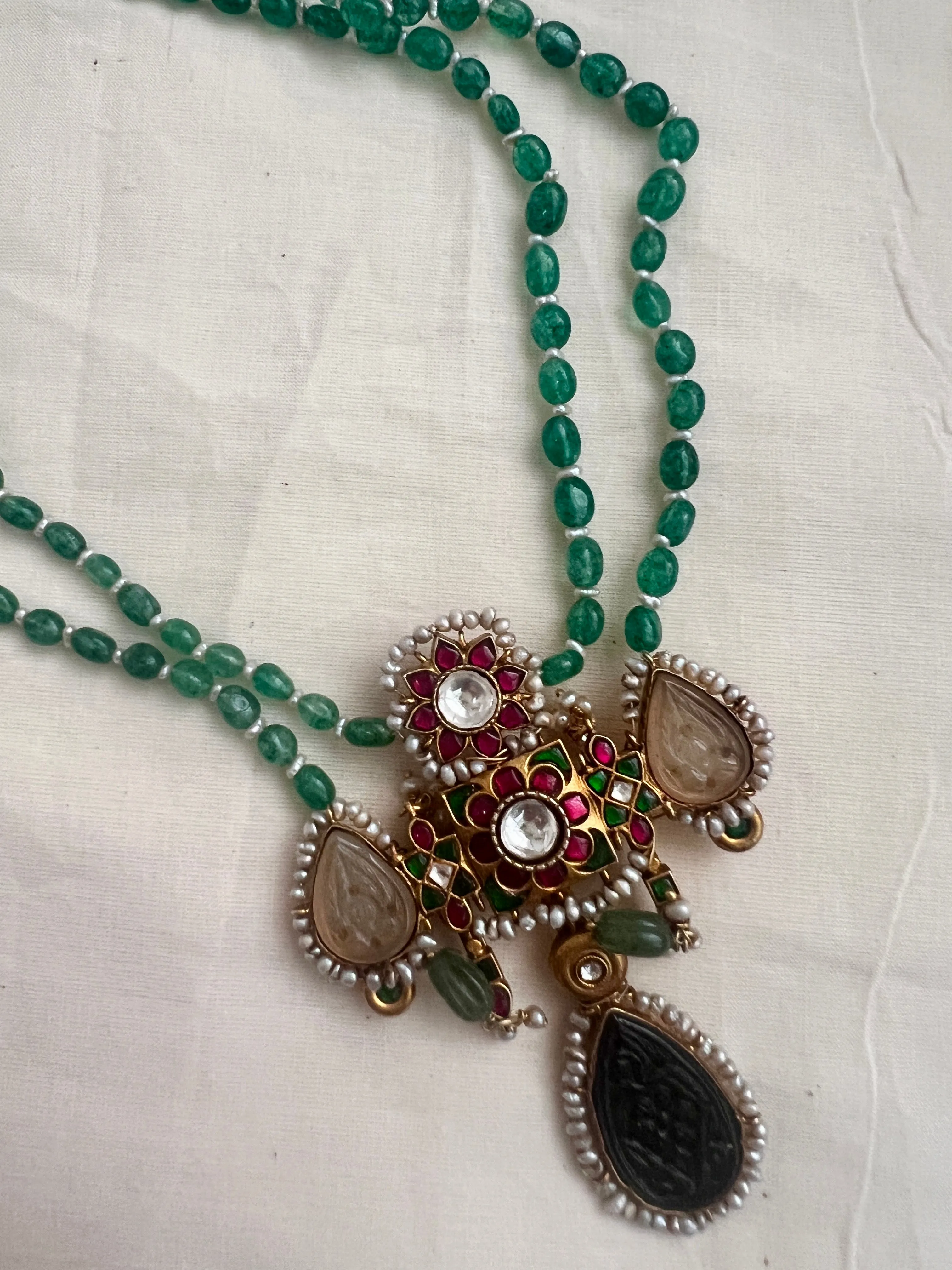 Gold polish stimulated kundan, ruby & emerald pendant,  jade & pearls beads chain