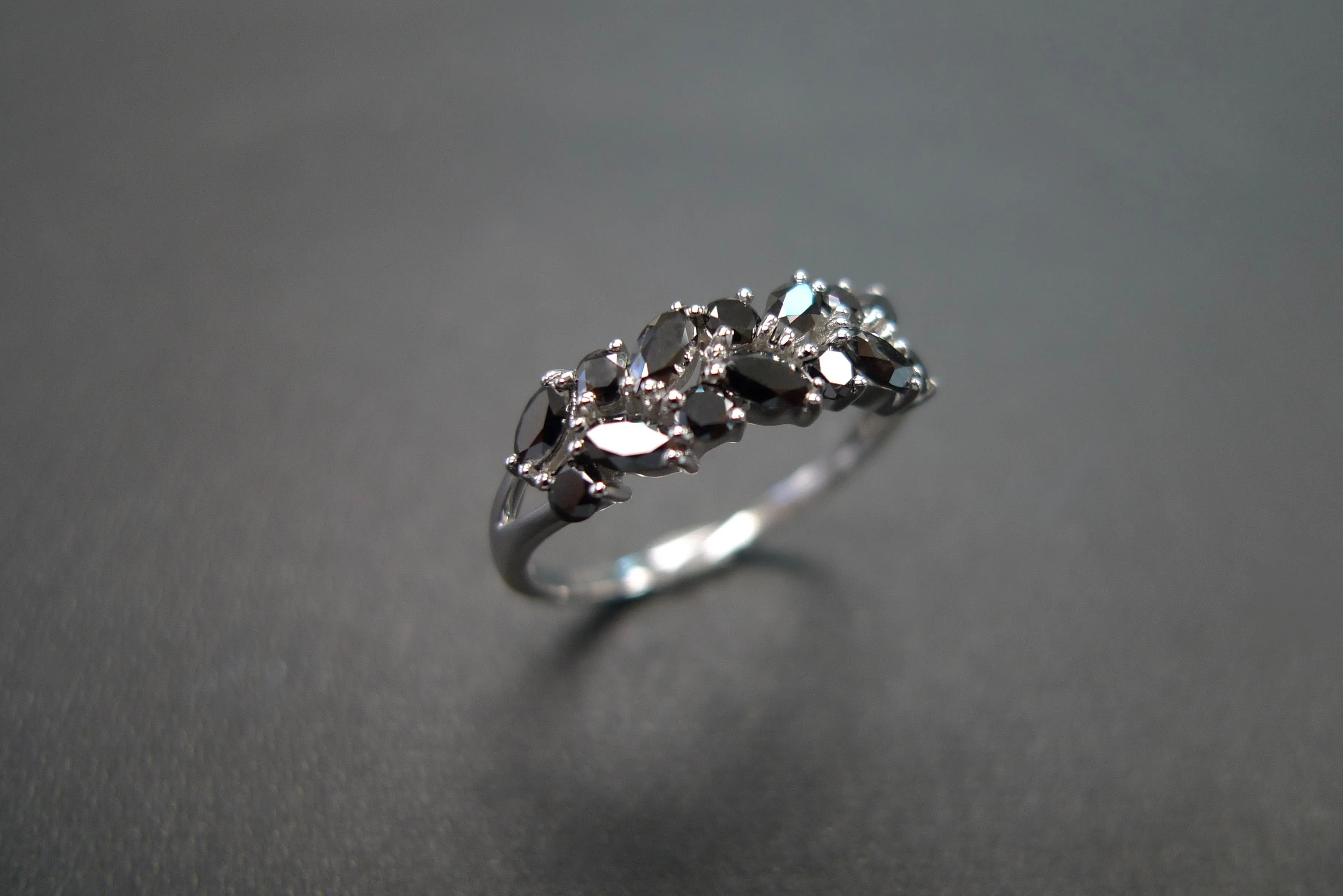 Marquise Cut and Round Cut Black Diamond Ring in White Gold