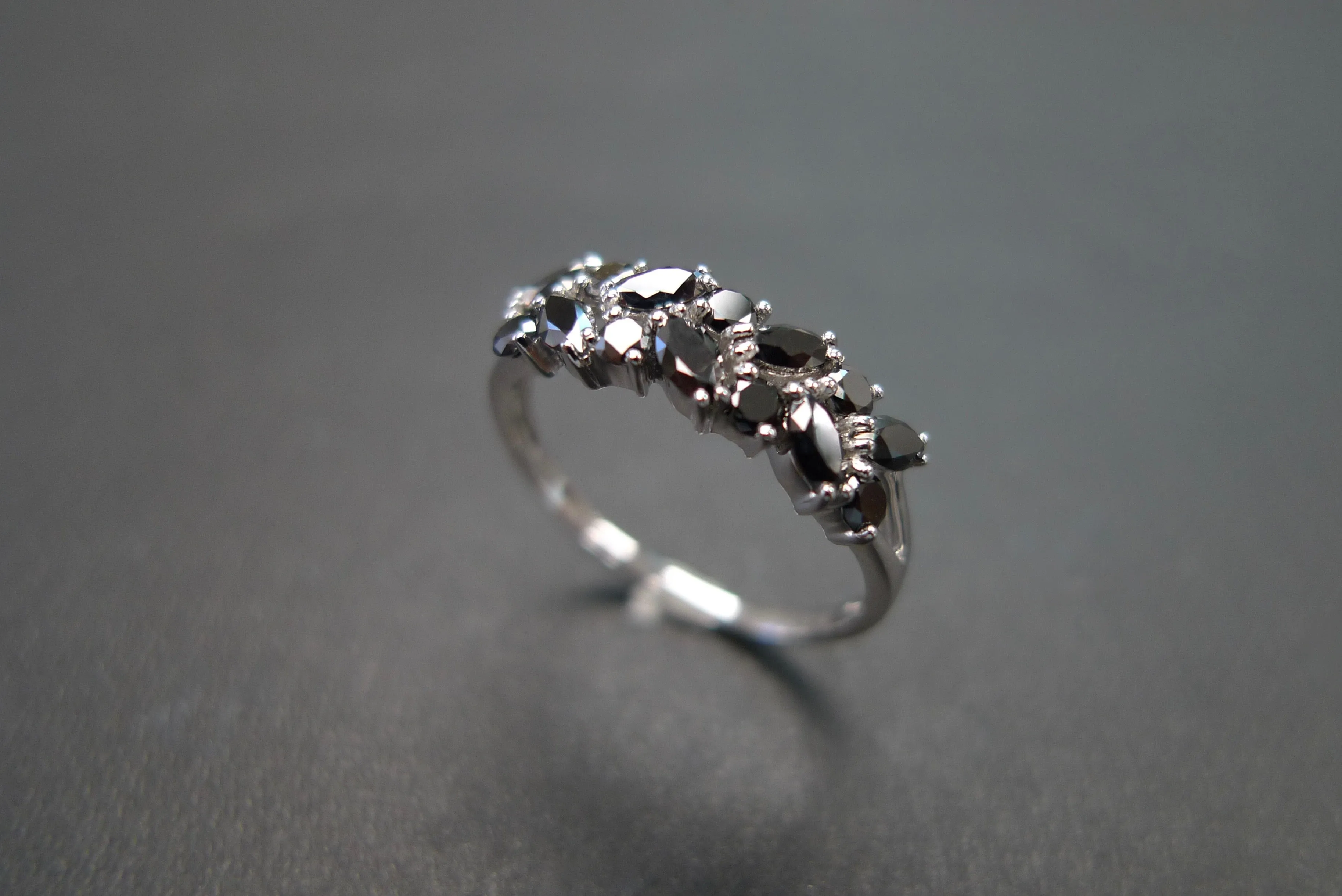 Marquise Cut and Round Cut Black Diamond Ring in White Gold