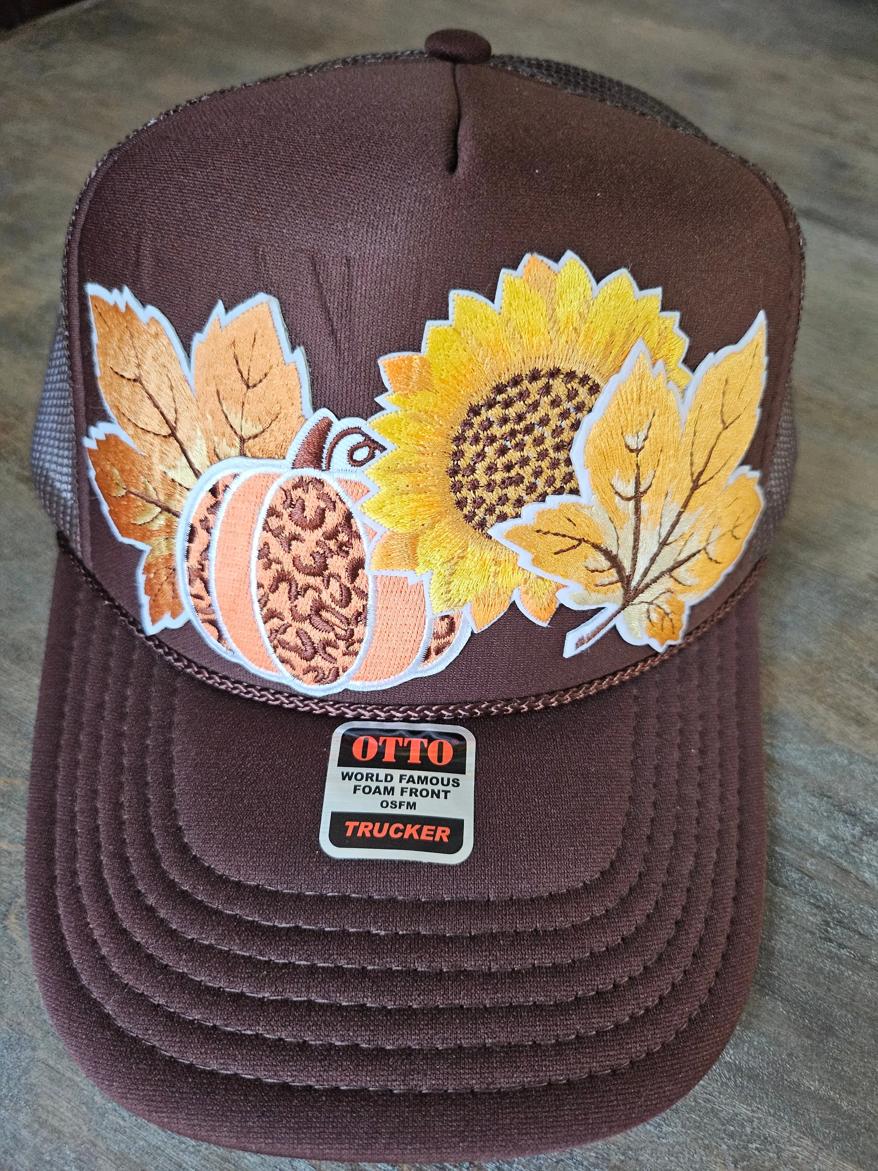 Trucker hat custom with fall leaves and sunflower embroidered patches