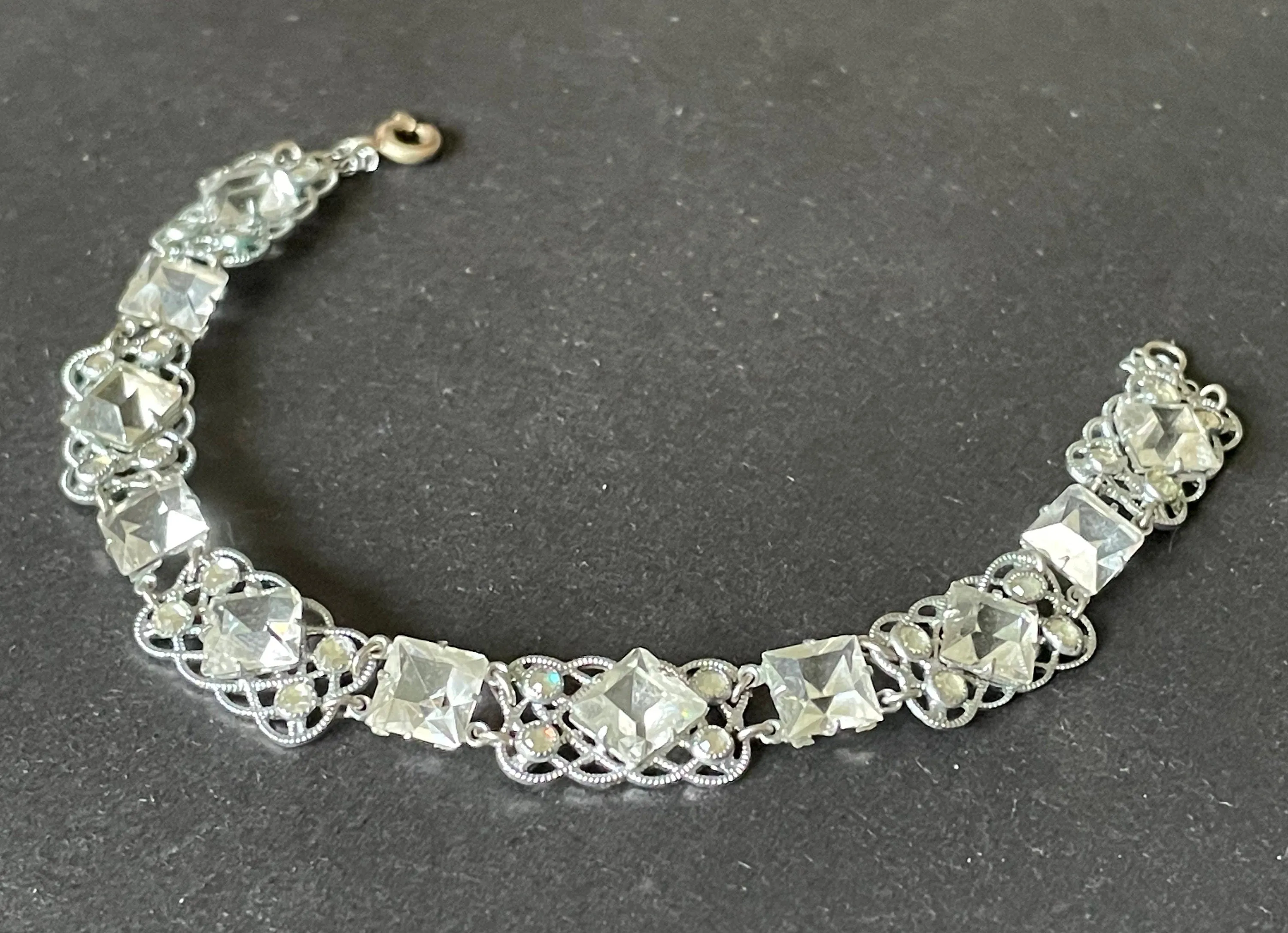 Vintage bracelet, Art Deco paste rhinestone and open backed princess cut crystal geometric silver tone filigree cocktail bracelet