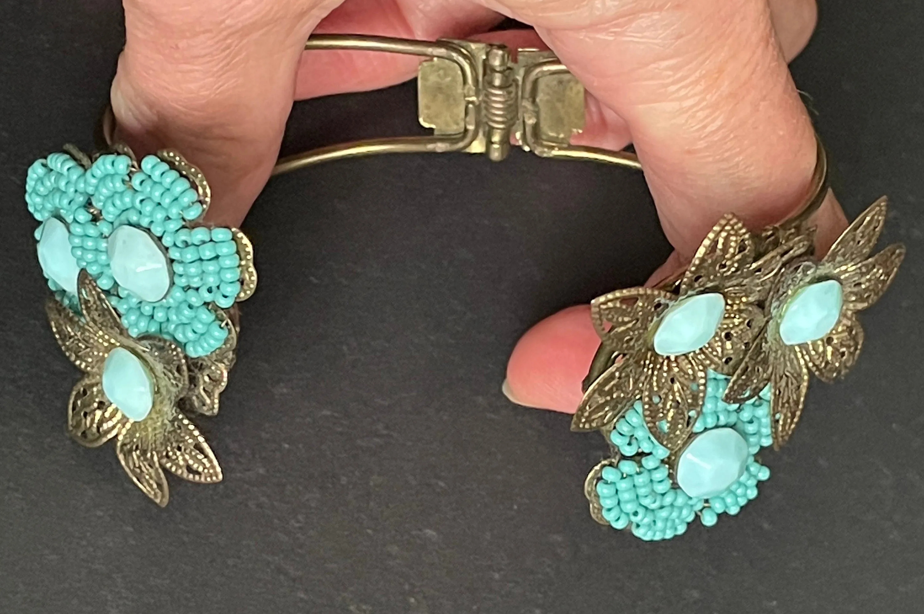 Vintage early Miriam Haskell turquoise blue glass beaded floral clamper bangle with intricate micro beading and gold tone filigree