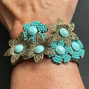 Vintage early Miriam Haskell turquoise blue glass beaded floral clamper bangle with intricate micro beading and gold tone filigree